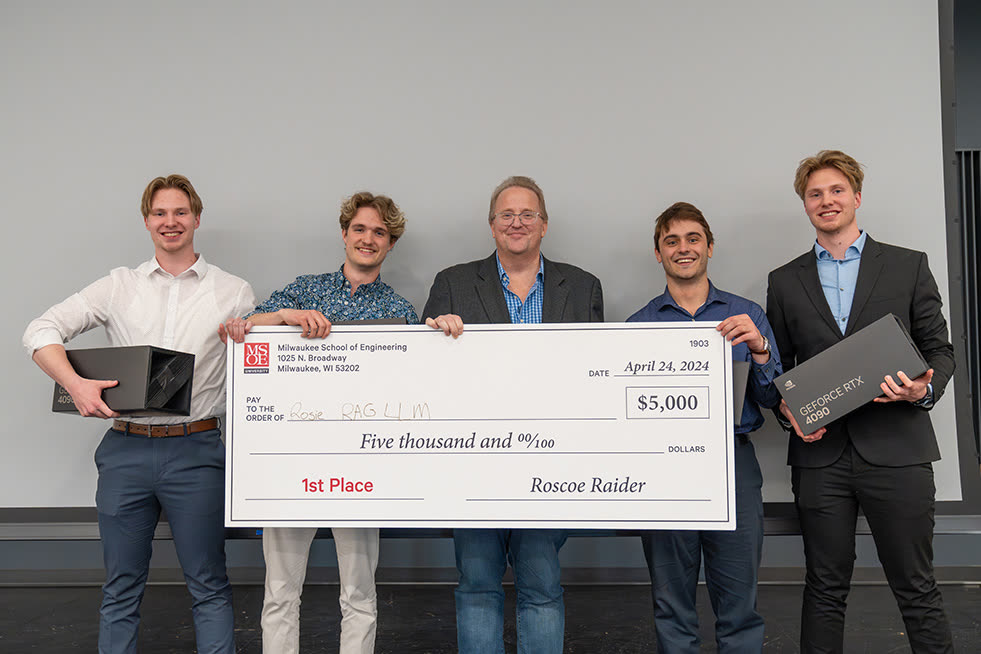 The 2024 ROSIE Super Challenge first-place team with their check.